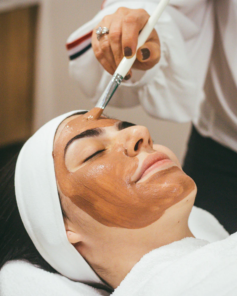 Client receiving a facial mask treatment