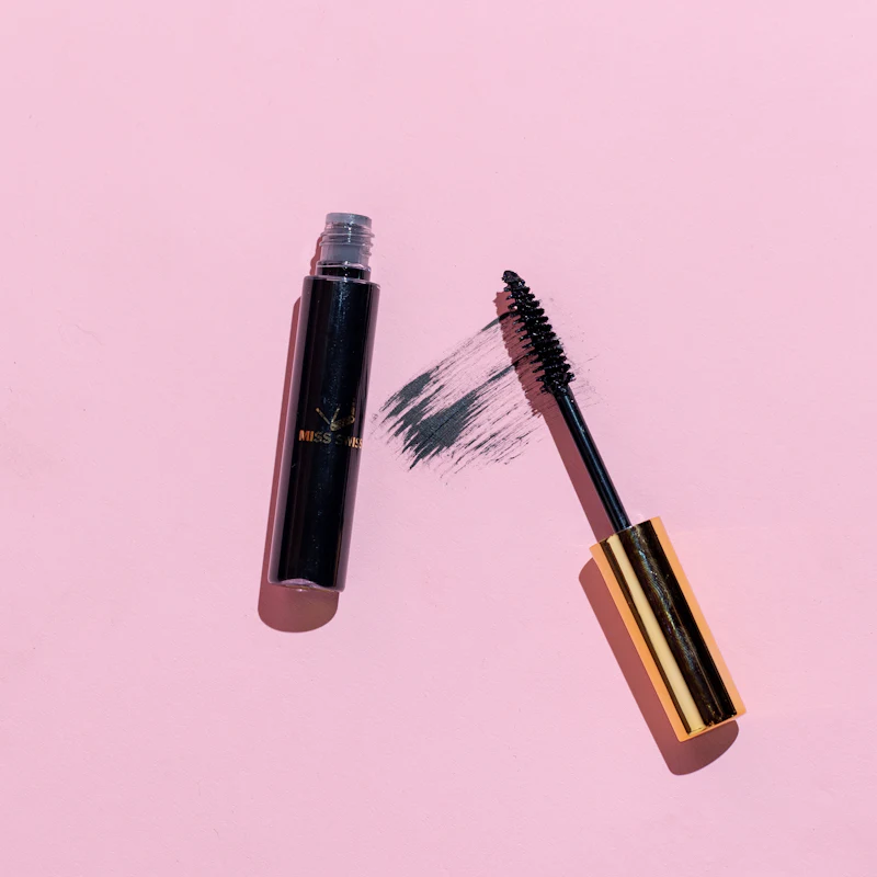 Mascara on pink background