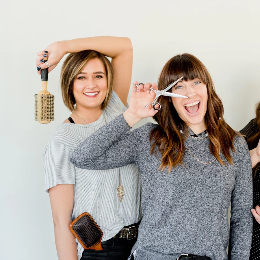 Smiling stylists of the salon team